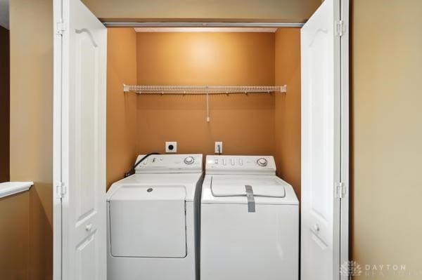 9266 Great Lakes Cir, Washington Twp, OH 45458 - laundry area with washing machine and dryer