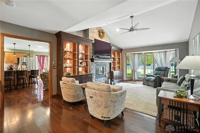 95 Sycamore Creek Dr, Springboro, OH 45066 - living room featuring a fireplace, a ceiling fan, dark wood finished floors, and high vaulted ceiling