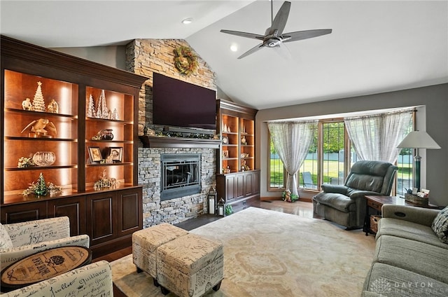 95 Sycamore Creek Dr, Springboro, OH 45066 - living area with lofted ceiling, a fireplace, ceiling fan, and wood finished floors