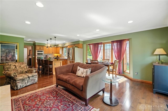 95 Sycamore Creek Dr, Springboro, OH 45066 - living area with ornamental molding, wood finished floors, and recessed lighting