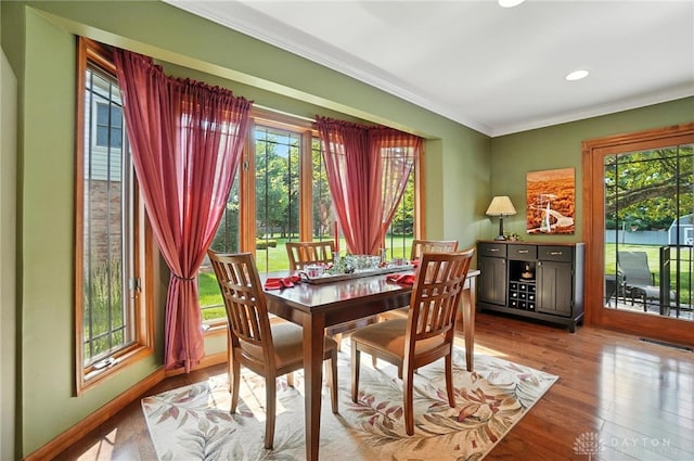 95 Sycamore Creek Dr, Springboro, OH 45066 - dining space with ornamental molding, wood finished floors, and recessed lighting