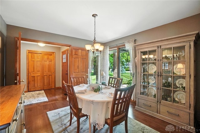 95 Sycamore Creek Dr, Springboro, OH 45066 - dining room with dark wood finished floors and a chandelier
