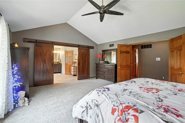 95 Sycamore Creek Dr, Springboro, OH 45066 - bedroom with a barn door, light colored carpet, a ceiling fan, high vaulted ceiling, and ensuite bathroom