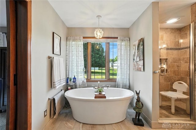 95 Sycamore Creek Dr, Springboro, OH 45066 - full bath with a freestanding tub and a tile shower