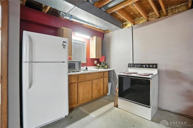 95 Sycamore Creek Dr, Springboro, OH 45066 - kitchen with white appliances, concrete floors, light countertops, and brown cabinets
