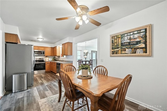 3755 Everett Dr, Loveland, OH 45140 - dining room featuring dark wood finished floors and a ceiling fan