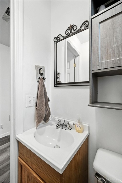 3755 Everett Dr, Loveland, OH 45140 - bathroom featuring vanity and wood finished floors