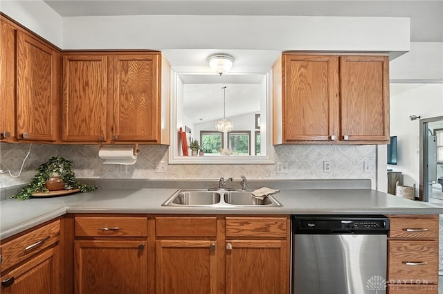 3755 Everett Dr, Loveland, OH 45140 - kitchen with dishwasher, backsplash, brown cabinetry, light countertops, and vaulted ceiling