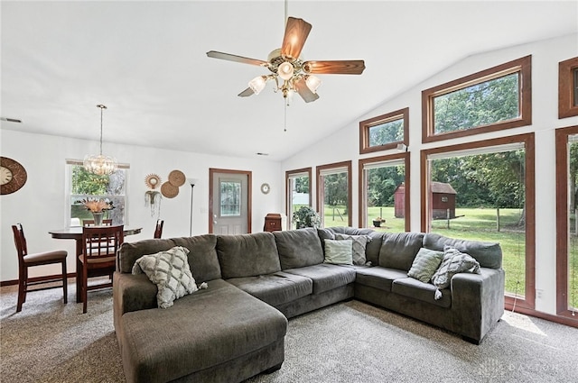 3755 Everett Dr, Loveland, OH 45140 - carpeted living area featuring lofted ceiling, a ceiling fan, and a chandelier