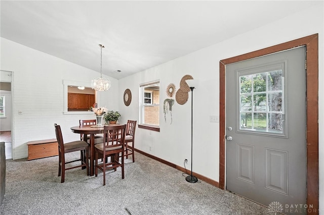 3755 Everett Dr, Loveland, OH 45140 - dining space with vaulted ceiling, a chandelier, and carpet