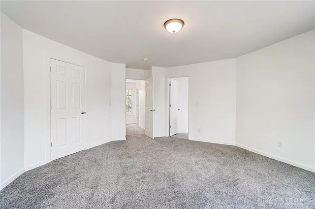 233 Alton Ave, Dayton, OH 45404 - unfurnished bedroom featuring carpet floors and baseboards