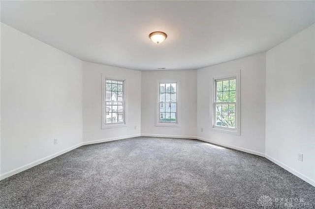 233 Alton Ave, Dayton, OH 45404 - carpeted empty room featuring baseboards