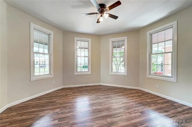 233 Alton Ave, Dayton, OH 45404 - unfurnished room with plenty of natural light, dark wood-type flooring, and ceiling fan