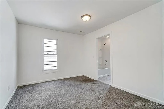 233 Alton Ave, Dayton, OH 45404 - carpeted spare room featuring baseboards