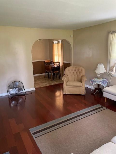 8120 Lawrence Dr, West Chester, OH 45069 - living room with arched walkways and wood finished floors