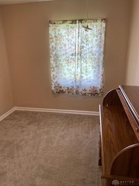 8120 Lawrence Dr, West Chester, OH 45069 - dining room featuring carpet floors and baseboards