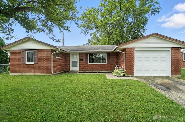 1393 Seminole Dr, Xenia, OH 45385 - single story home with brick siding, driveway, a front yard, and a garage