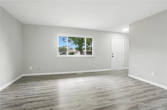 1393 Seminole Dr, Xenia, OH 45385 - spare room with baseboards and wood finished floors