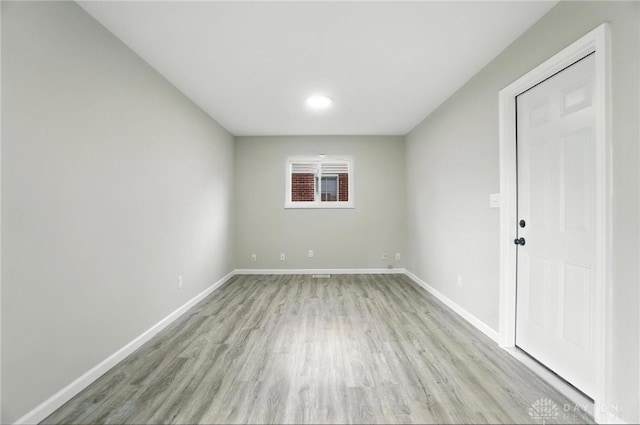 1393 Seminole Dr, Xenia, OH 45385 - empty room with light wood-style flooring and baseboards