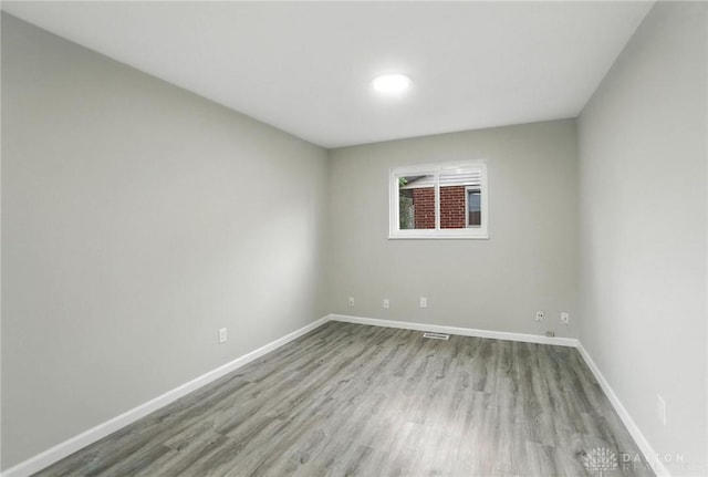 1393 Seminole Dr, Xenia, OH 45385 - empty room featuring wood finished floors and baseboards