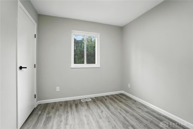 1393 Seminole Dr, Xenia, OH 45385 - unfurnished bedroom with light wood-style flooring and baseboards