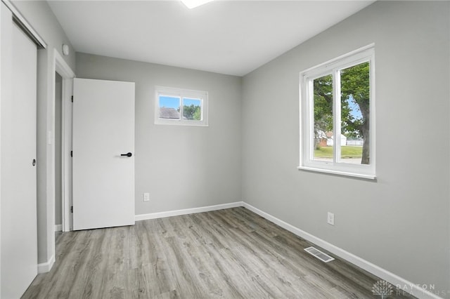 1393 Seminole Dr, Xenia, OH 45385 - unfurnished bedroom with wood finished floors and a closet