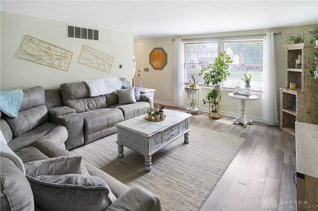 1464 New Way Dr, Beavercreek, OH 45434 - living area featuring wood finished floors and baseboards