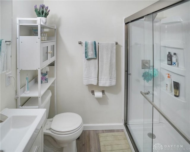1464 New Way Dr, Beavercreek, OH 45434 - full bath with wood finished floors, a stall shower, and vanity