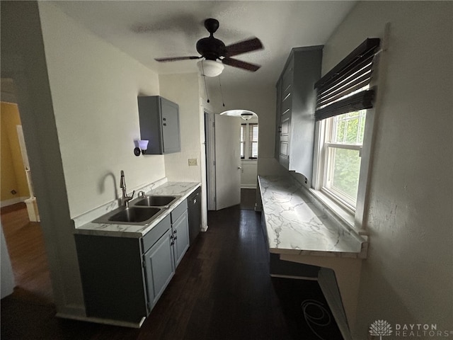 725 Sunnyview Ave, Dayton, OH 45406 - kitchen featuring gray cabinetry, dark wood-style floors, light countertops, and ceiling fan