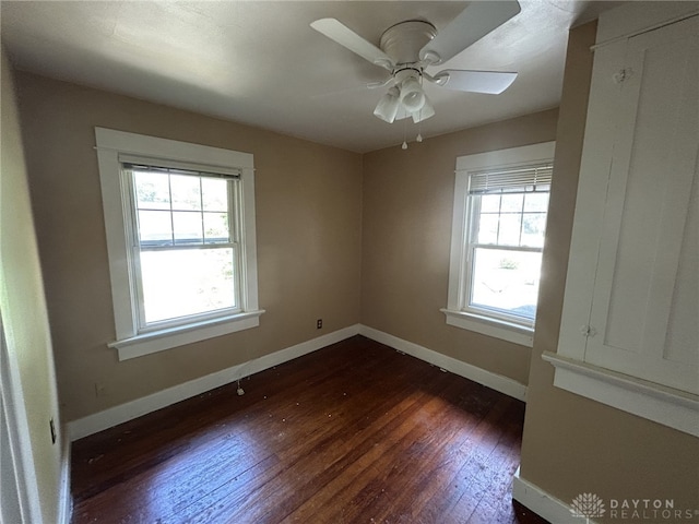 725 Sunnyview Ave, Dayton, OH 45406 - empty room with dark wood finished floors and ceiling fan