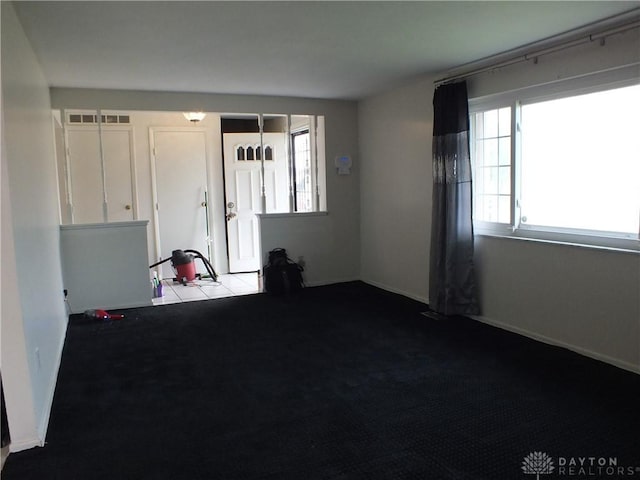 5582 Camerford Dr, Dayton, OH 45424 - carpeted spare room with baseboards