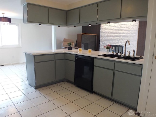 5582 Camerford Dr, Dayton, OH 45424 - kitchen with dishwasher, gray cabinets, light countertops, light tile patterned flooring, and backsplash