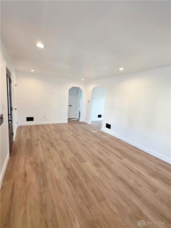 21 Anderson St, Dayton, OH 45410 - spare room with arched walkways, light wood-type flooring, and recessed lighting