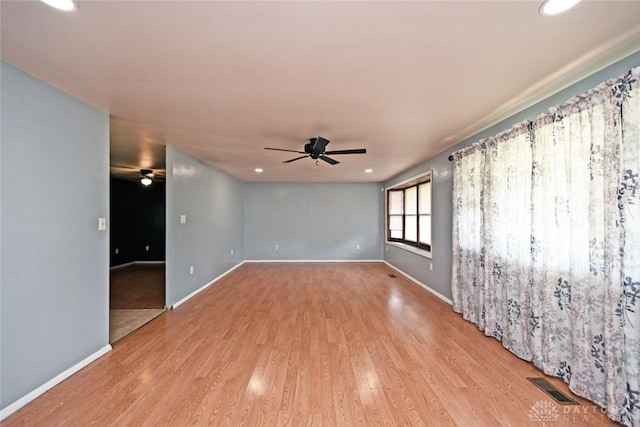 405 Parsons Ct, Englewood, OH 45322 - spare room featuring a ceiling fan, wood finished floors, and recessed lighting