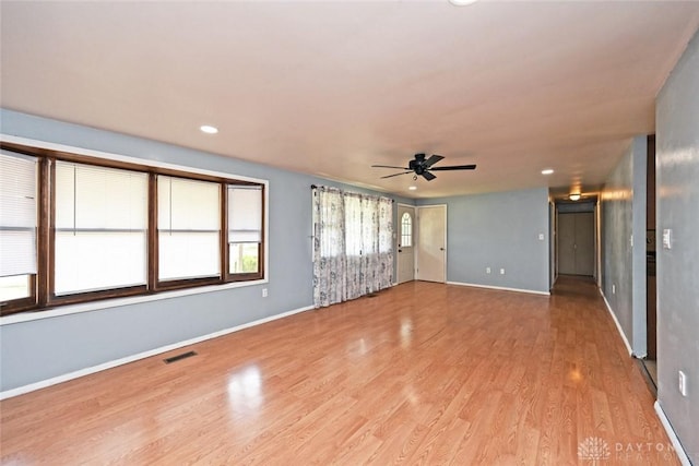 405 Parsons Ct, Englewood, OH 45322 - spare room featuring a ceiling fan, light wood-style floors, and recessed lighting