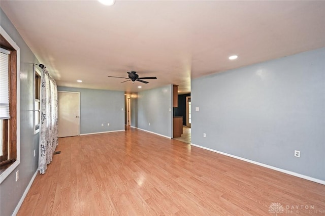 405 Parsons Ct, Englewood, OH 45322 - empty room featuring a ceiling fan, light wood-style floors, and recessed lighting