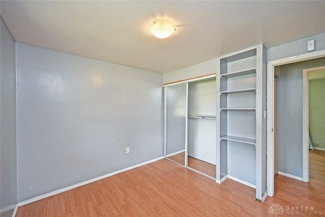 405 Parsons Ct, Englewood, OH 45322 - unfurnished bedroom with wood finished floors and a closet
