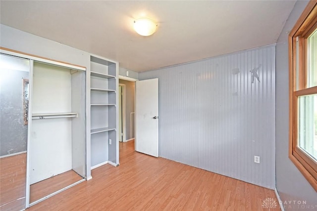 405 Parsons Ct, Englewood, OH 45322 - unfurnished bedroom featuring wood finished floors and a closet