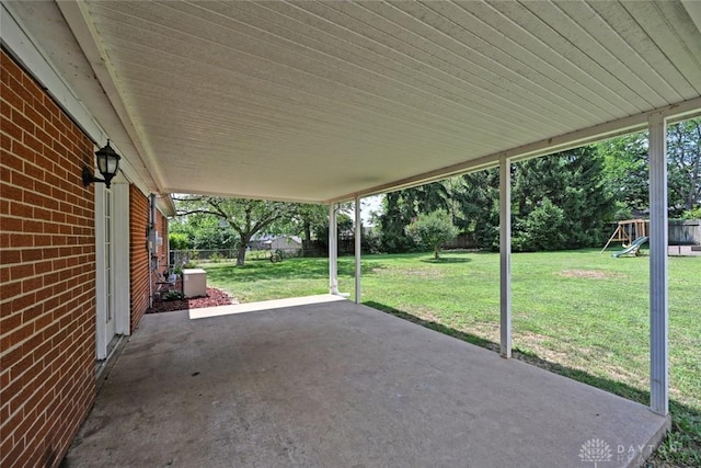 405 Parsons Ct, Englewood, OH 45322 - fenced backyard featuring a patio area and a playground