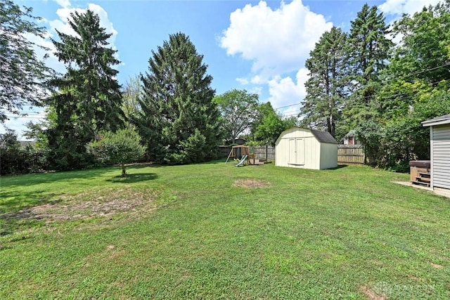 405 Parsons Ct, Englewood, OH 45322 - view of yard featuring a storage unit and a playground