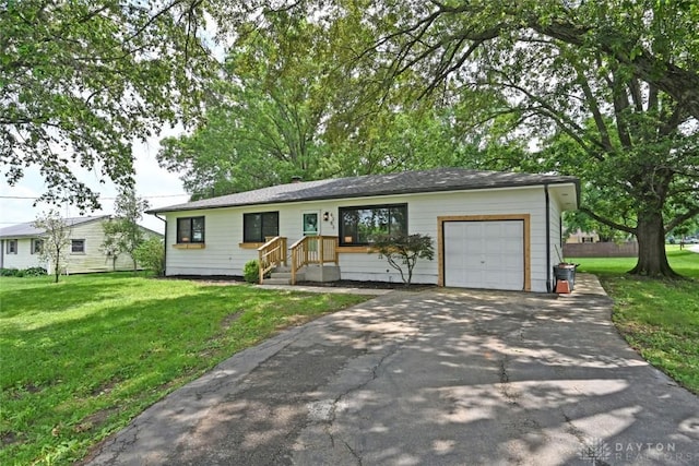 6383 Todhunter Rd, Middletown, OH 45044 - ranch-style home with a garage, a front lawn, and driveway