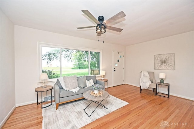 6383 Todhunter Rd, Middletown, OH 45044 - living area featuring light wood finished floors and ceiling fan