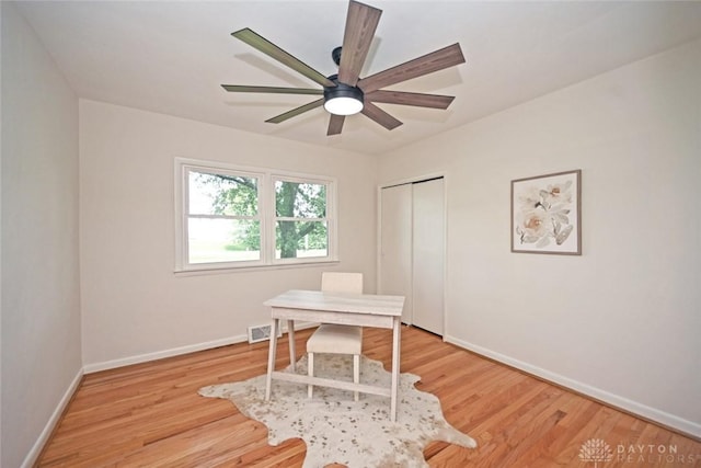 6383 Todhunter Rd, Middletown, OH 45044 - home office with ceiling fan and light wood-style floors