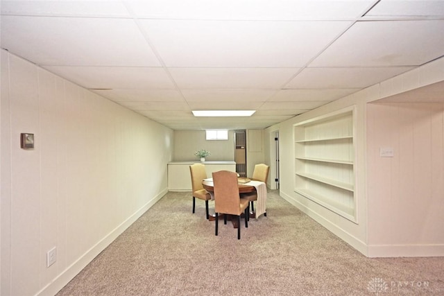 6383 Todhunter Rd, Middletown, OH 45044 - dining space featuring built in features, light colored carpet, and a drop ceiling