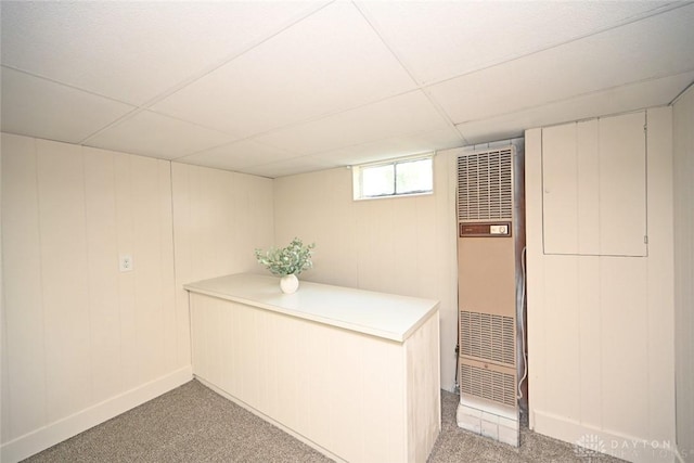 6383 Todhunter Rd, Middletown, OH 45044 - basement featuring a heating unit, a paneled ceiling, and light colored carpet