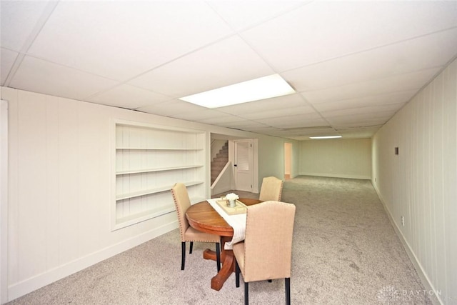 6383 Todhunter Rd, Middletown, OH 45044 - carpeted dining room with built in shelves and a drop ceiling