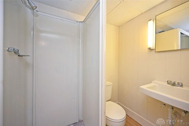 6383 Todhunter Rd, Middletown, OH 45044 - full bathroom featuring a shower and wood finished floors