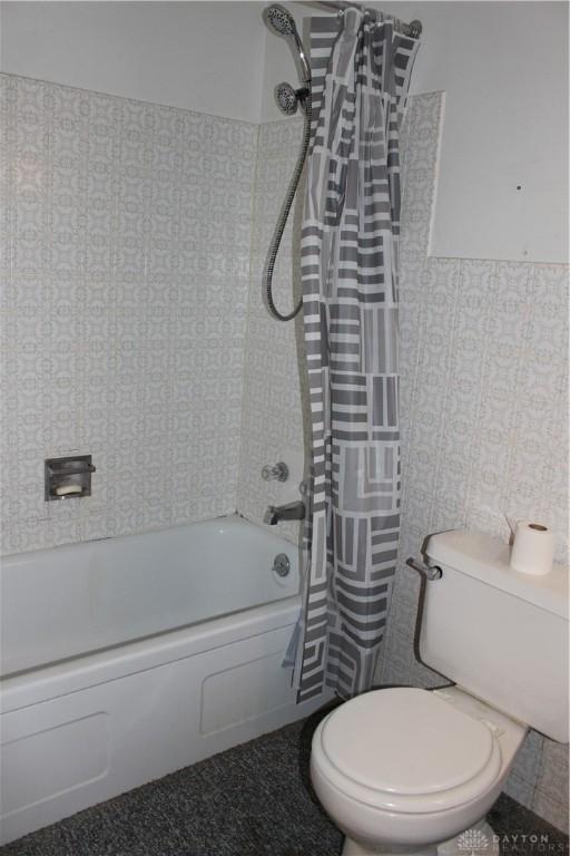 4912 Powell Rd, Huber Heights, OH 45424 - bathroom with shower / tub combo and toilet