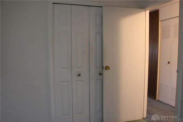 4912 Powell Rd, Huber Heights, OH 45424 - unfurnished bedroom featuring light colored carpet and a closet
