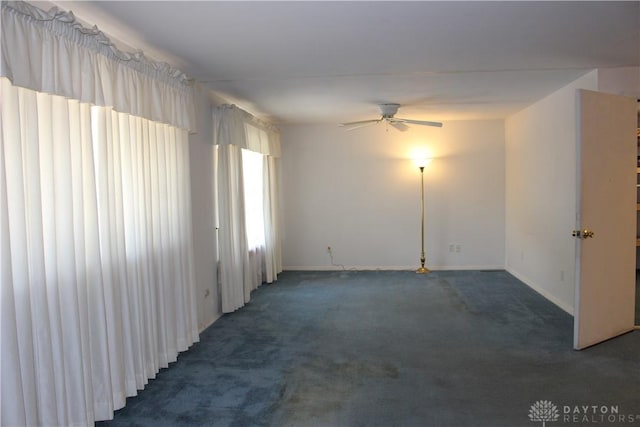 4912 Powell Rd, Huber Heights, OH 45424 - unfurnished room featuring carpet flooring and a ceiling fan